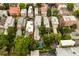 Aerial view of residential homes with rooftops and trees, showcasing the neighborhood layout at 62 Society St, Charleston, SC 29401