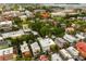 Aerial view of a neighborhood with a mix of colorful houses and green trees at 62 Society St, Charleston, SC 29401