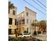 Charming Charleston-style home with a covered porch and unique architecture in a historic neighborhood at 62 Society St, Charleston, SC 29401