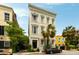This three-story home features gorgeous architectural details and is conveniently located next to downtown Charleston at 62 Society St, Charleston, SC 29401