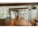 Open-concept living area featuring hardwood floors and views into the kitchen at 62 Society St, Charleston, SC 29401