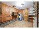 A functional basement area with concrete block walls, a water heater, and shelving at 625 Ocean Blvd, Isle of Palms, SC 29451