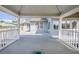 Open-air deck featuring an architectural gazebo and panoramic neighborhood views at 625 Ocean Blvd, Isle of Palms, SC 29451