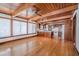 Spacious kitchen with wood-beamed ceiling, hardwood floors, and lots of light at 625 Ocean Blvd, Isle of Palms, SC 29451