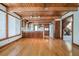 Bright, open-concept kitchen with wood-beamed ceiling and hardwood floors at 625 Ocean Blvd, Isle of Palms, SC 29451