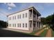 Side view of a two-story home featuring a double porch and ample windows at 63 Montagu St, Charleston, SC 29401