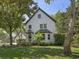 A charming two story home with a lush landscaped front yard at 699 Castle Pinckney Dr, James Island, SC 29412