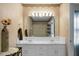 Bathroom with double sinks, vase with flowers, and large mirror at 702 Minus St, Saint George, SC 29477