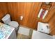 Compact bathroom with toilet, sink, and colorful patterned accents at 702 Minus St, Saint George, SC 29477