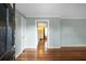 Inviting entryway with freshly painted walls, hardwood floors, and elegant trim work at 702 Minus St, Saint George, SC 29477