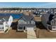 Aerial view showcases the property's prime location near a scenic pond, surrounded by a well-planned community at 705 Squire Pope Rd, Summerville, SC 29486