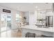 Bright eat-in kitchen featuring a kitchen island and dining area at 705 Squire Pope Rd, Summerville, SC 29486