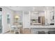 Bright eat-in kitchen featuring gray cabinets, stainless steel appliances and wood-look flooring at 705 Squire Pope Rd, Summerville, SC 29486