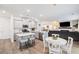 Open concept living space showcasing a modern kitchen, dining area and living room at 705 Squire Pope Rd, Summerville, SC 29486