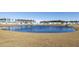 Scenic view of the large pond in the neighborhood, offering a tranquil and picturesque setting for residents at 705 Squire Pope Rd, Summerville, SC 29486
