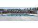 A long swimming pool for exercise sits in front of the beautiful homes at 705 Squire Pope Rd, Summerville, SC 29486