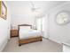 Airy bedroom featuring a wicker bed frame, ceiling fan and ample natural light at 73 Fairway Dunes Ln, Isle of Palms, SC 29451