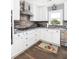 Beautiful kitchen with stainless steel appliances, granite countertops, and charming decorative accents at 73 Fairway Dunes Ln, Isle of Palms, SC 29451