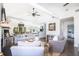 Open-concept living room with modern furniture, stylish decor, and great natural lighting throughout the space at 73 Fairway Dunes Ln, Isle of Palms, SC 29451