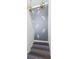 Unique staircase showcases modern stair runner design and decorative rope lighting at 73 Fairway Dunes Ln, Isle of Palms, SC 29451