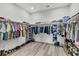Spacious walk-in closet with custom shelving, racks, and ample storage for clothing, shoes, and accessories at 733 Oakridge View Trl, Ridgeville, SC 29472