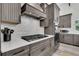 Kitchen features stainless steel appliances, custom cabinetry, and ample counter space at 733 Oakridge View Trl, Ridgeville, SC 29472