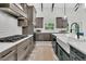Modern kitchen with stainless steel appliances, stylish cabinetry, and a spacious layout at 733 Oakridge View Trl, Ridgeville, SC 29472