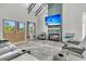 Stylish living room features a fireplace, comfortable seating, and an inviting ambiance at 733 Oakridge View Trl, Ridgeville, SC 29472