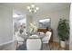 Charming dining room connects to kitchen, features modern decor, and offers abundant natural light at 7965 Edgebrook Cir # F, North Charleston, SC 29418