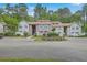 Well-kept condo community featuring manicured landscaping and dedicated parking spaces at 7965 Edgebrook Cir # F, North Charleston, SC 29418