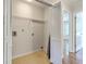 Laundry room with white walls, tile floor, and washer/dryer hookups at 7965 Edgebrook Cir # F, North Charleston, SC 29418