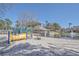Community playground with slides and play area near a pond and building at 7965 Edgebrook Cir # F, North Charleston, SC 29418
