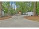 Gated community storage lot with a trailer, boat and other vehicles at 7965 Edgebrook Cir # F, North Charleston, SC 29418