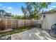 Fenced backyard with a concrete patio area, a shed, and some grassy spaces at 801 Reserve Way, Summerville, SC 29485