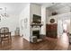 Bright living room featuring hardwood floors, fireplace, and neutral walls at 801 Reserve Way, Summerville, SC 29485