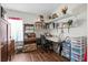 Bright office space with built-in shelves, a desk, and plenty of natural light at 801 Reserve Way, Summerville, SC 29485