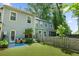 Fenced backyard featuring patio furniture, and mature trees at 849 Bibury Ct, Charleston, SC 29414