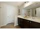 Bathroom with double vanity, spacious mirror, and modern finishes at 849 Bibury Ct, Charleston, SC 29414