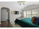Inviting bedroom with ceiling fan, a TV, and a cozy rug at 849 Bibury Ct, Charleston, SC 29414