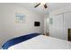 Bright bedroom featuring a ceiling fan, TV, and serene artwork at 849 Bibury Ct, Charleston, SC 29414