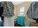 Walk-in closet with custom shelving, a dresser, and ample storage space at 849 Bibury Ct, Charleston, SC 29414