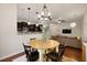 Well-appointed dining and living space with a kitchen view and modern furnishings at 849 Bibury Ct, Charleston, SC 29414
