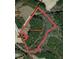 Aerial view of the property and the surrounding landscape and trees at 9995 Lodge Hwy, Lodge, SC 29082