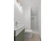 Modern bathroom with a stylish vanity, a toilet, and a walk-in shower featuring a white tile surround at 103 Sylvan Ter, Summerville, SC 29485