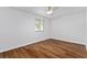 Bright bedroom featuring laminate floors, window, and ceiling fan at 103 Sylvan Ter, Summerville, SC 29485