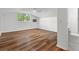 Spacious bedroom features wood floors, a window, and an ensuite bathroom at 103 Sylvan Ter, Summerville, SC 29485