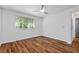 Well-lit bedroom with laminate flooring, ceiling fan, and window at 103 Sylvan Ter, Summerville, SC 29485