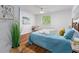 Bright and airy bedroom with hardwood floors, ceiling fan, and a relaxing atmosphere at 103 Sylvan Ter, Summerville, SC 29485