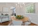 Classic dining room design that provides soft natural light and easy access to the kitchen at 103 Sylvan Ter, Summerville, SC 29485