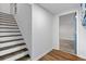 The hallway features wood stairs with access to the laundry room at 103 Sylvan Ter, Summerville, SC 29485